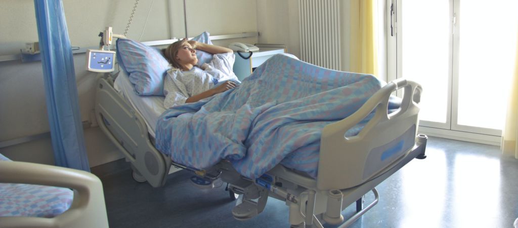 Woman laying in a hospital bed