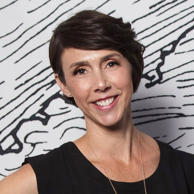 Headshot of Alyssa from Gold Coast Doulas wearing a black tank top against a black and white background