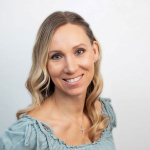 Jenee Clardige headshot for Gold Coast Doulas wearing a blue top