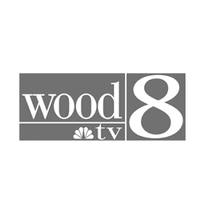 Wood TV 8 Logo in black and white without background