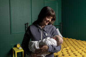 Gold Coast Doula holding newborn baby