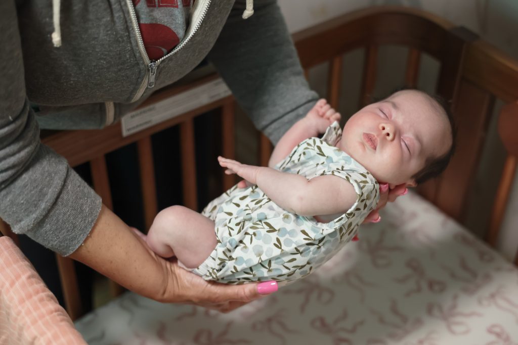 Baby in crib sleeping